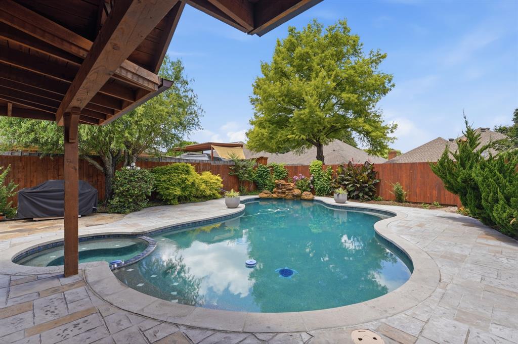 This backyard steals the show for sure, pool & spa.
