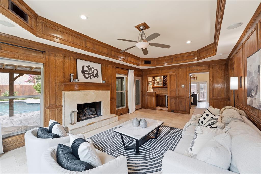 Enjoy a nice cup of coffee next to this cozy fireplace while enjoying the amazing outdoor view.