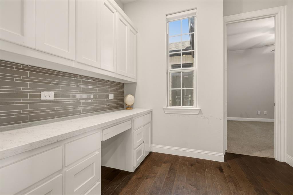 Built in Desk with Cabinets off of Kitchen