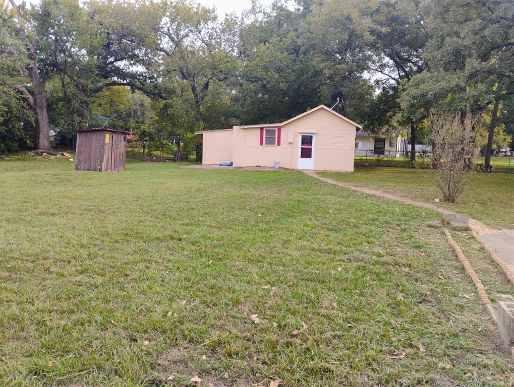 Expansive lot space from other family, paved walkway
