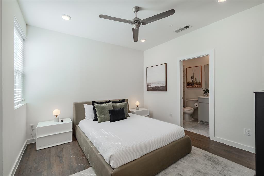 Wood-finish flooring, recessed lighting, ceiling fan, and window blinds