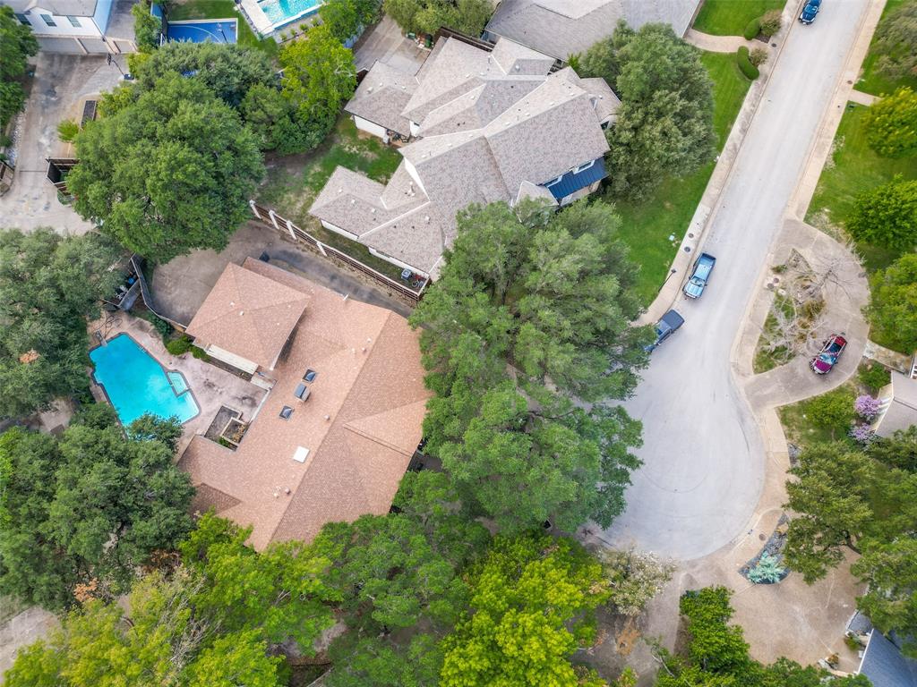 Aerial perspective featuring a .414 acre lot with mature landscaping, pool, large yard, situated on a great cul-de-sac street Aerial perspective featuring a .414 acre lot with mature landscaping, pool, large yard, situated on a great cul-de-sac street