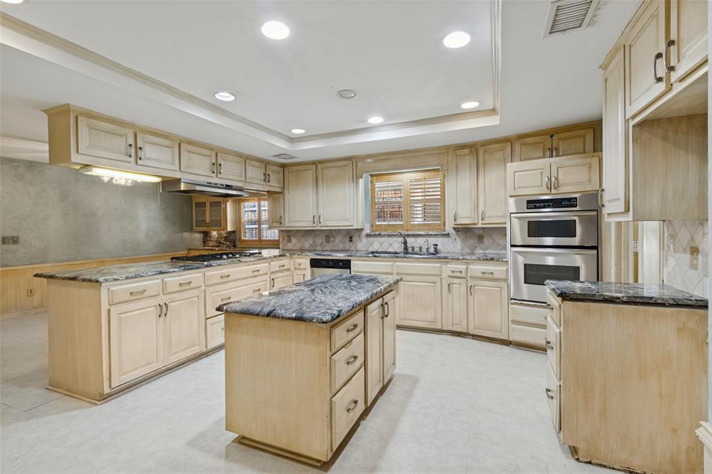 Kitchen featuring central island and a large walk-in pantry