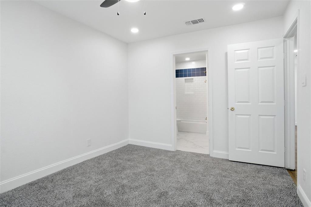 Primary bedroom with ensuite full bathroom
