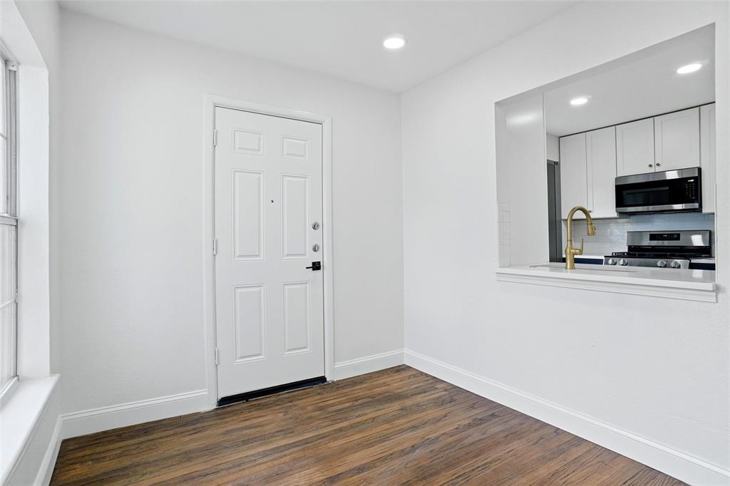 Dining room with door to backyard