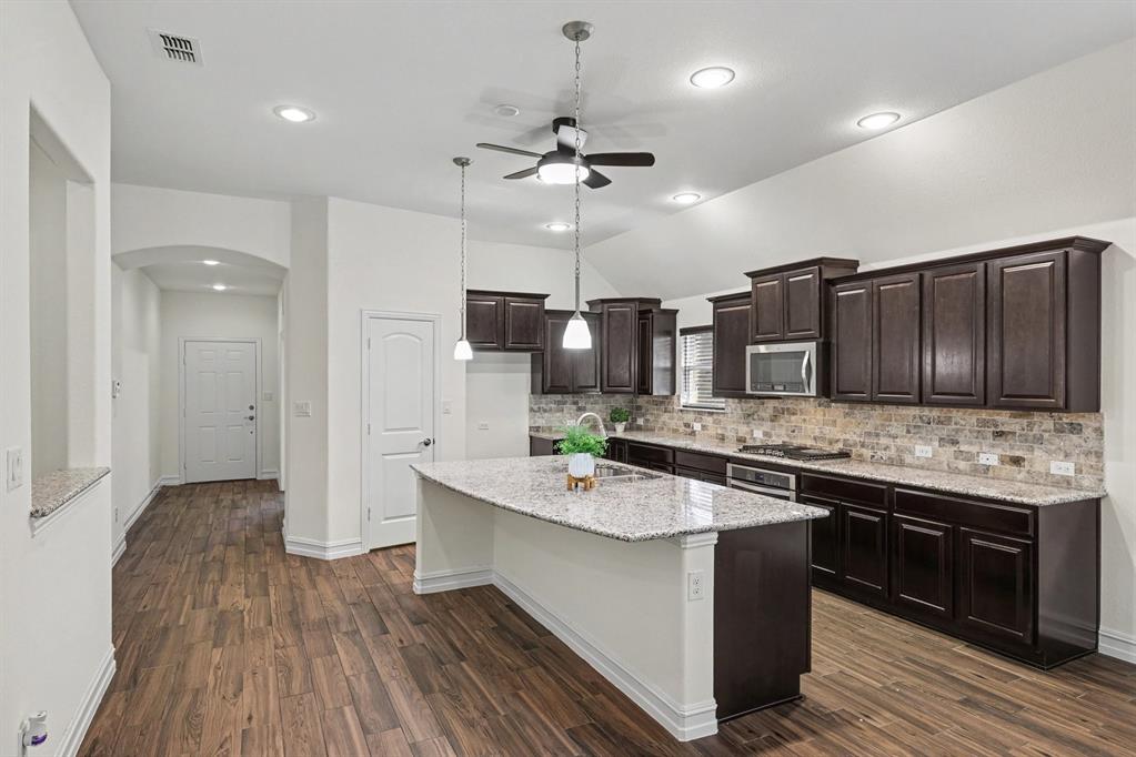 Beautiful kitchen with ceiling fan!