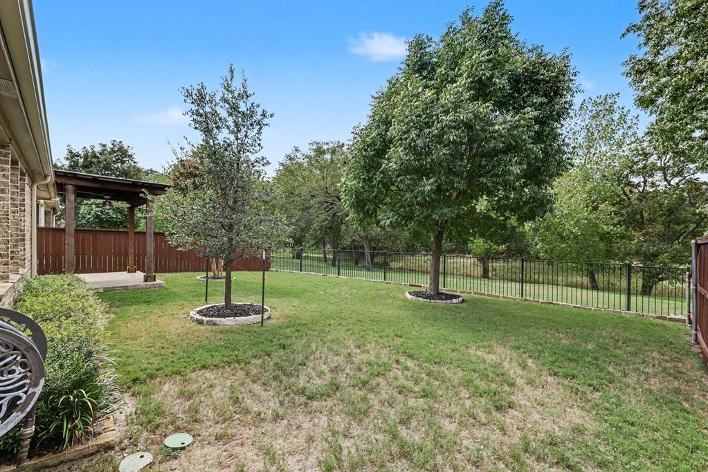 This is what you can come home to each day!Yard with trees and green space with private walking path for neighborhood residents only!