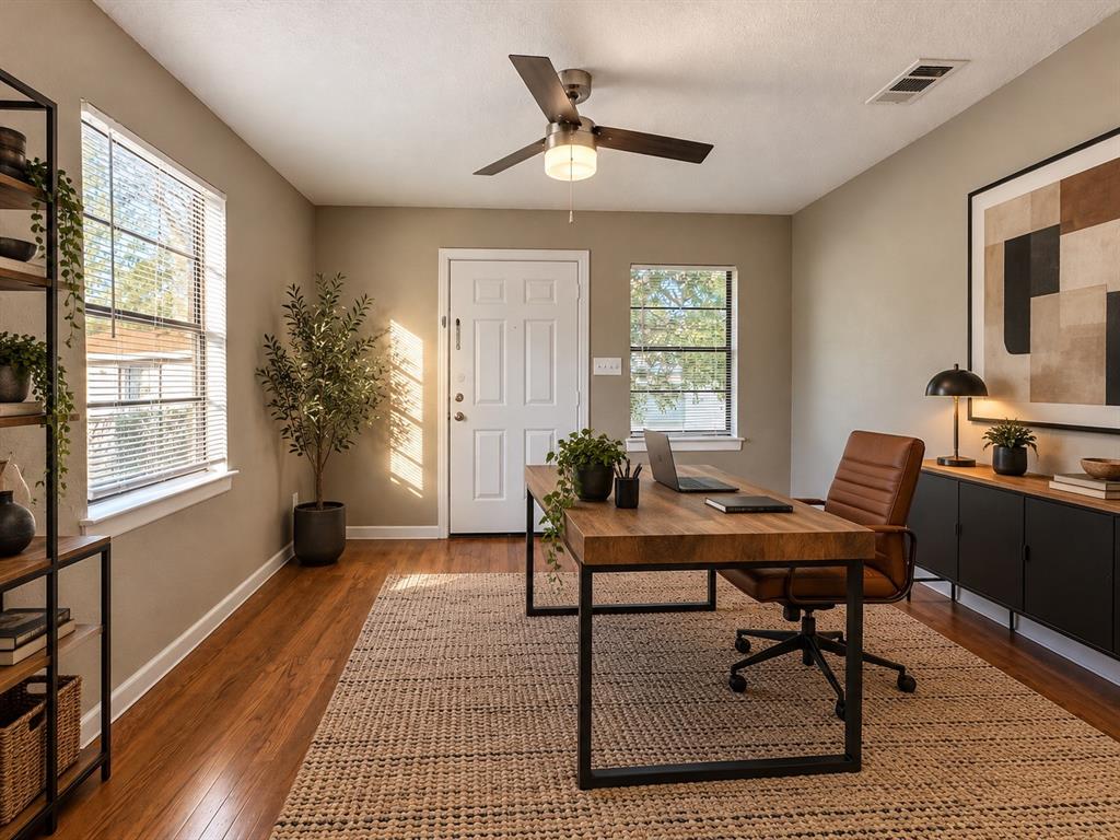 Office (Virtually Staged)Versatile bedroom virtually staged as a stylish home office, showcasing its flexible use.