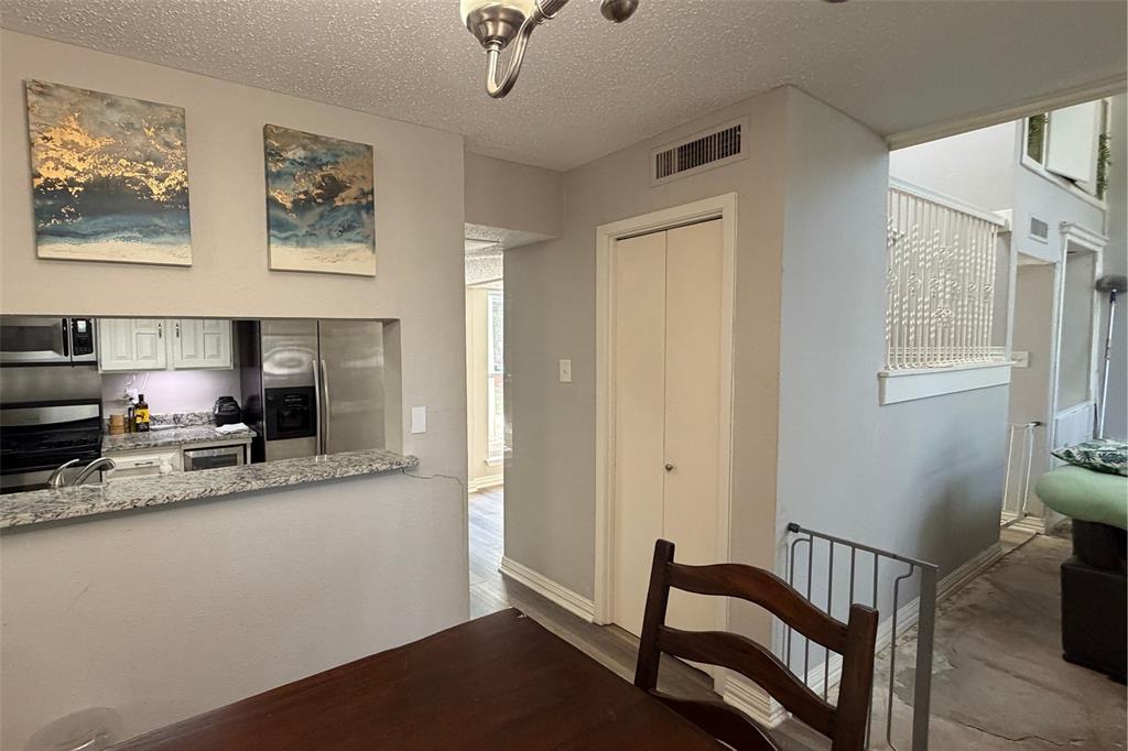 Dining Area with View of Kitchen and Living Area