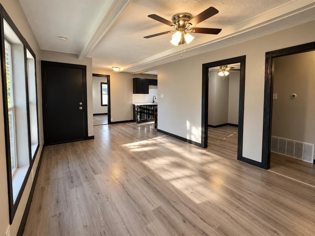 Another perspective highlighting the room’s layout and natural light.