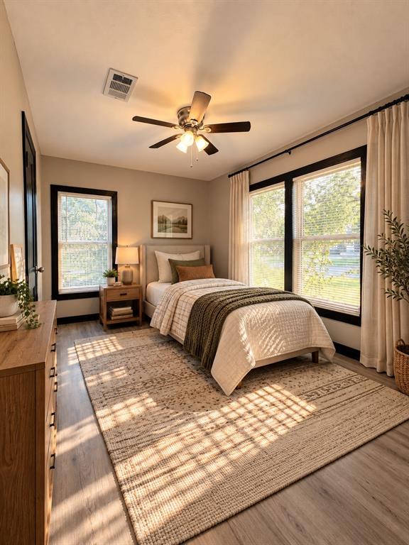 Virtually staged to demonstrate a cozy and functional bedroom layout.