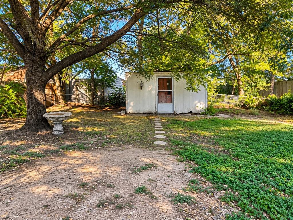 Outdoor space offering possibilities for gardening, entertaining, or creating your own retreat.