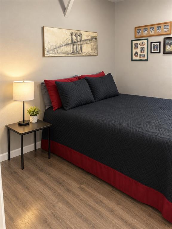 Wood-finish vinyl flooring and neutral wall paint