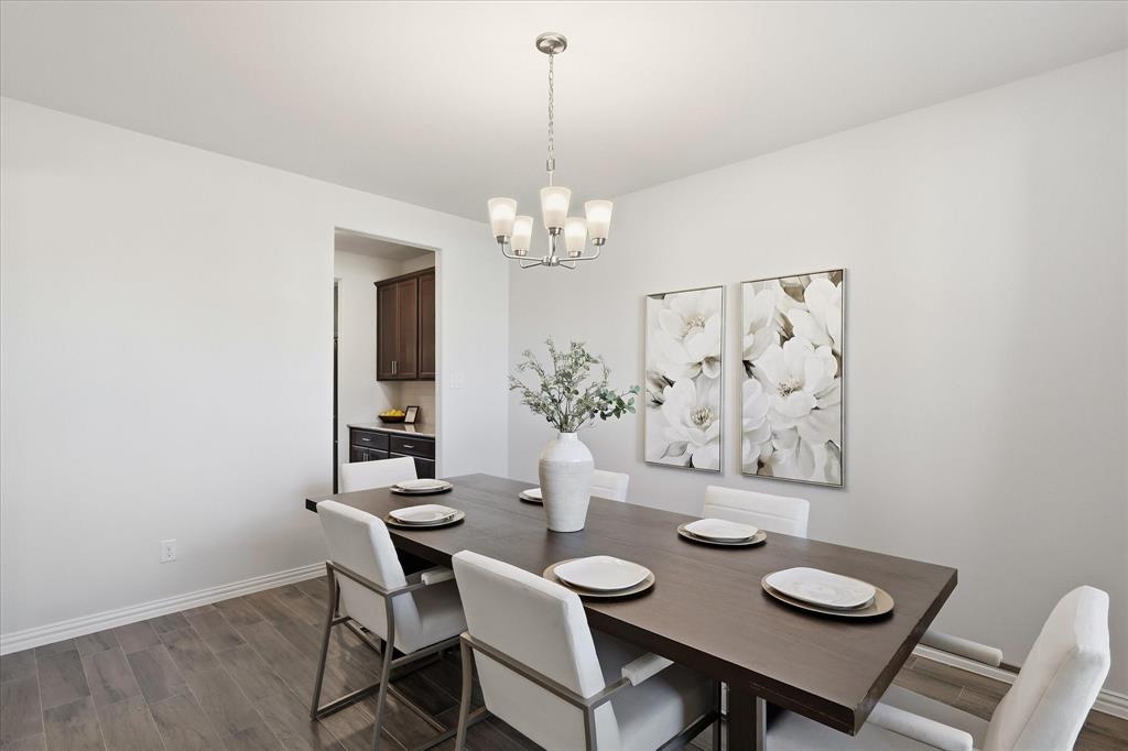 The formal dining room with access to the butlers