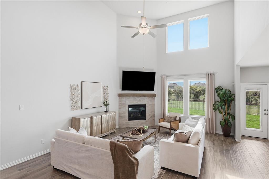 Vaulted ceilng, gas fireplace and an abundance of natural light
