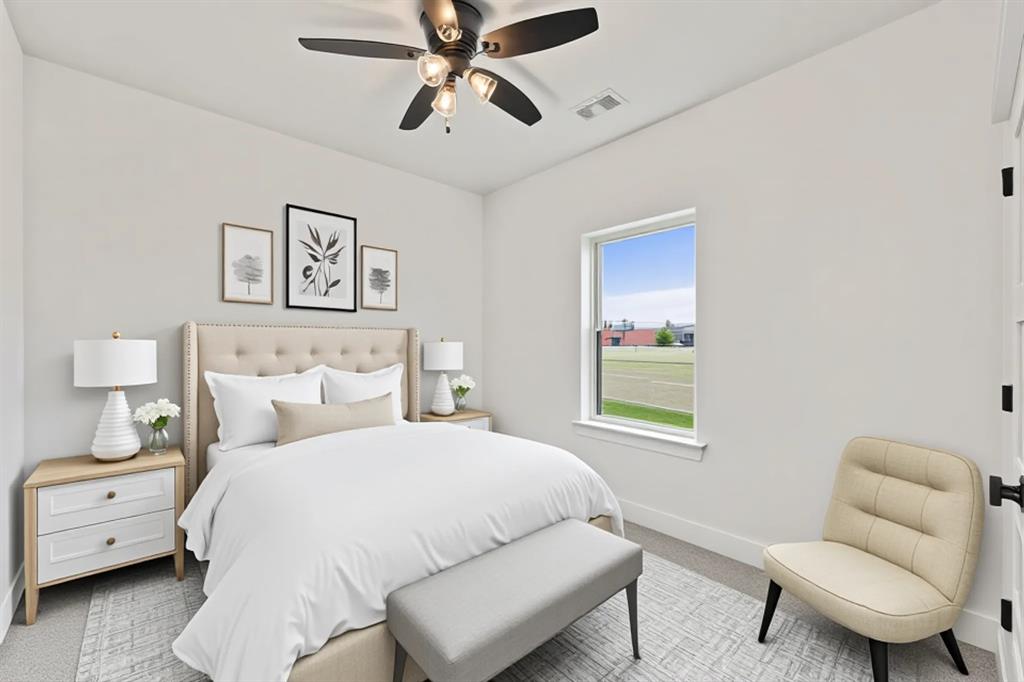 Bedroom featuring carpet flooring and ceiling fan