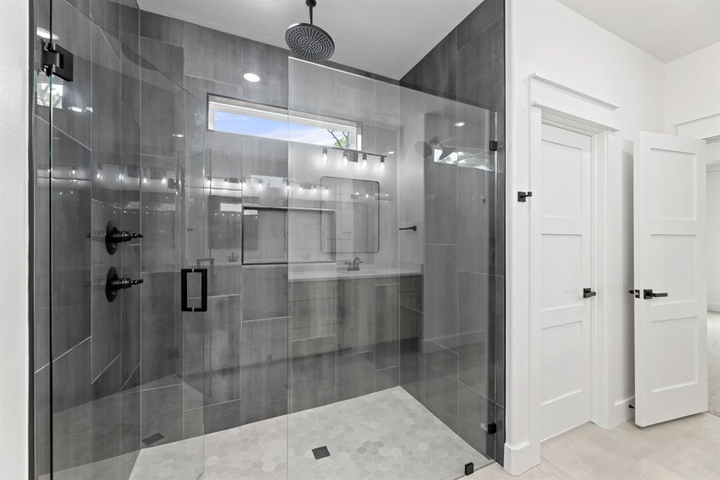Full bath with a shower stall