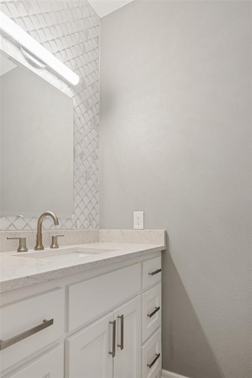This half bath is on the 1st level near the utility room and is just as beautiful as all the other bathrooms.