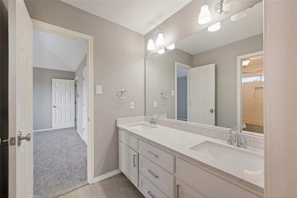 Serving 2 bedrooms, this Hollywood bath with double sinks and a private wet area is sure to please.