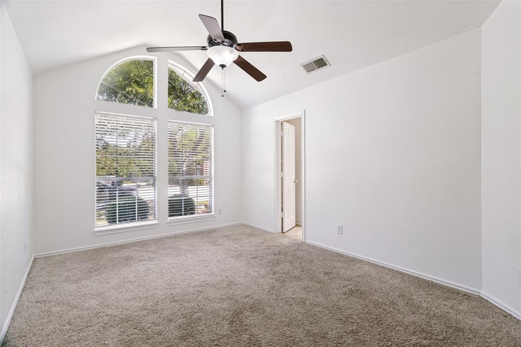 Oversized Primary bdrm with vaulted ceiling, ensuite full bath & fresh paint.