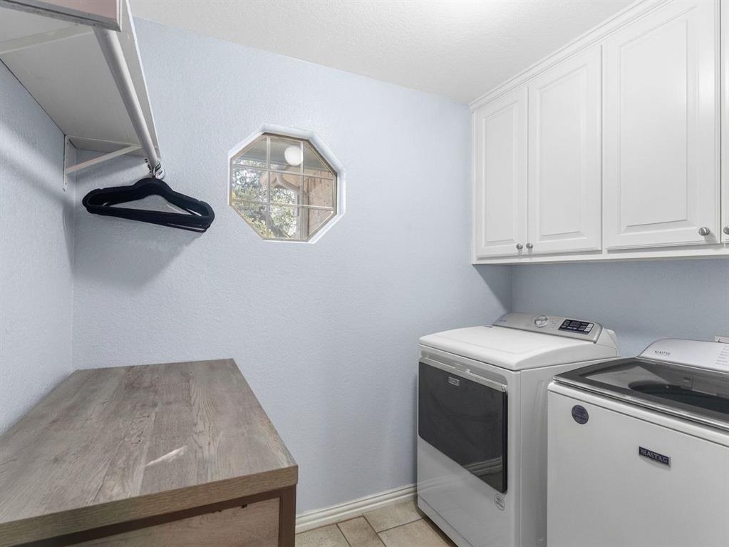 Laundry room located within steps of kitchen