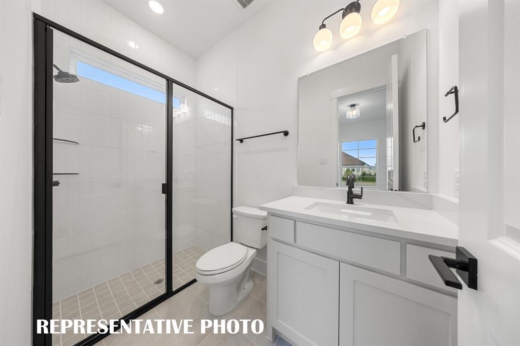 Friends and family will feel right at home in any of the beautifully finished guest baths this dream home has to offer.  REPRESENTATIVE PHOTO
