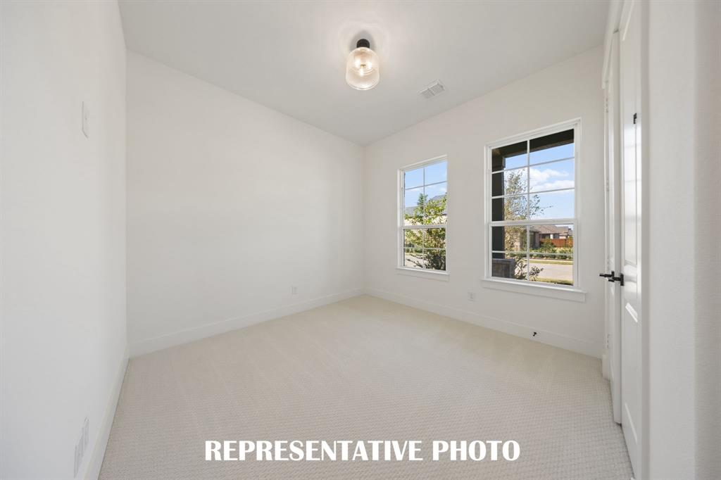 You'll find nicely sized secondary bedrooms in our Cathy floor plan.  REPRESENTATIVE PHOTO