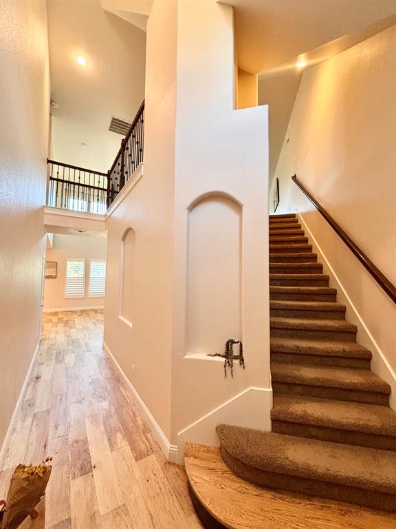 From the front door: newly sanded wood floors, paint throughout
