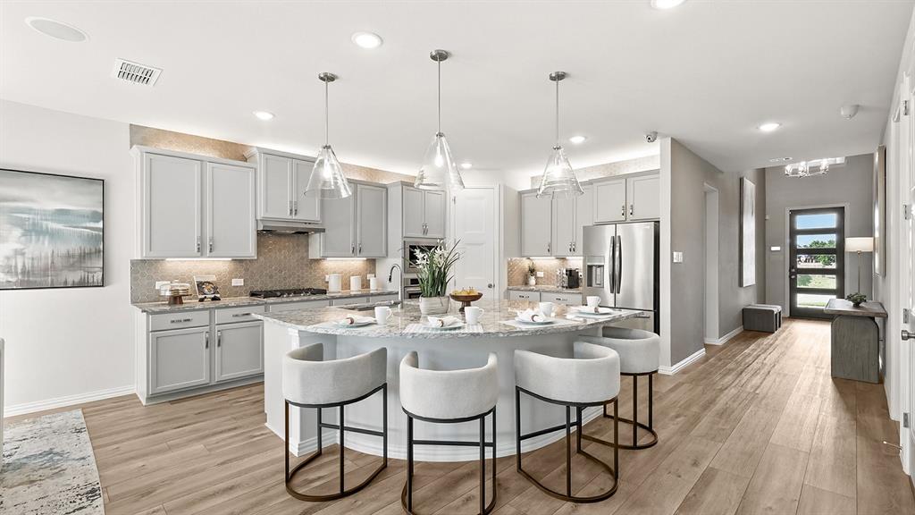 Model home photos of similar floorplans, not pictures of actual home.