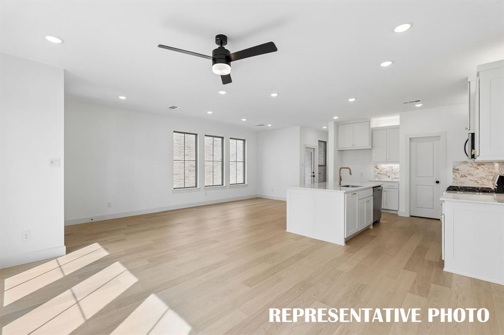 Open and flowing, our Audrey plan was designed for entertaining.  REPRESENTATIVE PHOTO