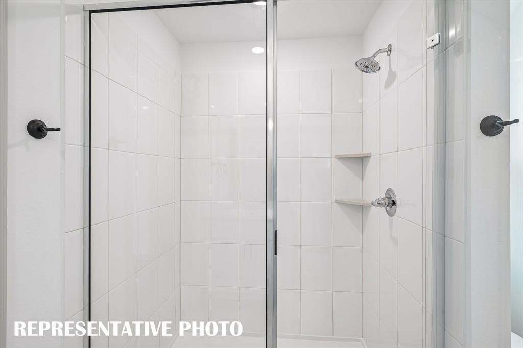 You'll enjoy a large walk in shower when you call this owner's bath your own!  REPRESENTATIVE PHOTO