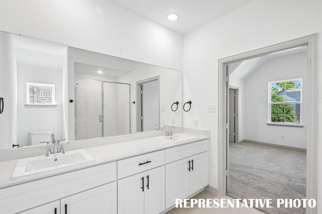Ample room for two in this wonderful owners bath.  REPRESENTATIVE PHOTO