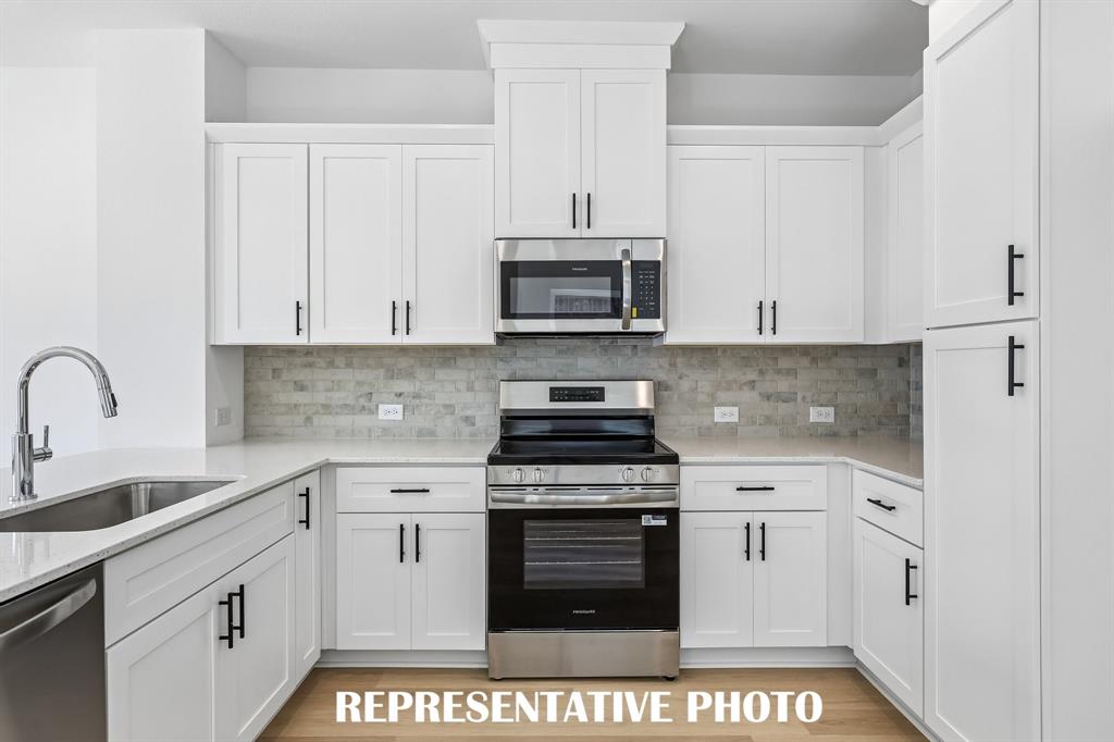 With ample storage and prep space, your inner chef will come alive in this beautiful kitchen!  REPRESENTATIVE PHOTO