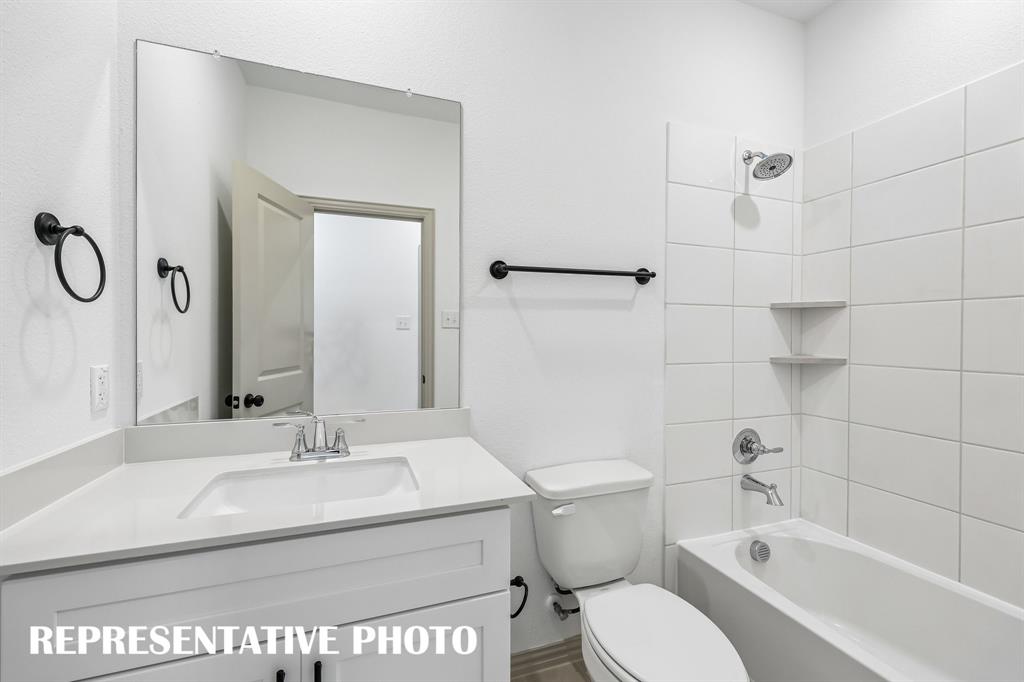 Guests will enjoy the privacy of their own full bath in this wonderful home!  REPRESENTATIVE PHOTO