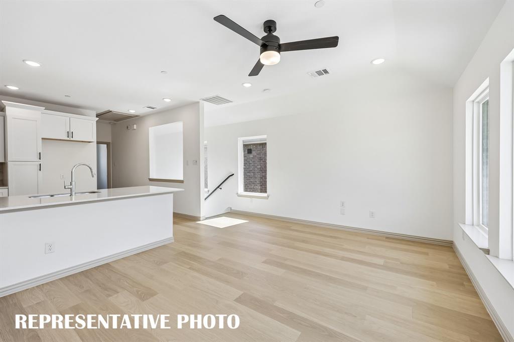 Upstairs offers a wonderful open concept living space.  REPRESENTATIVE PHOTO