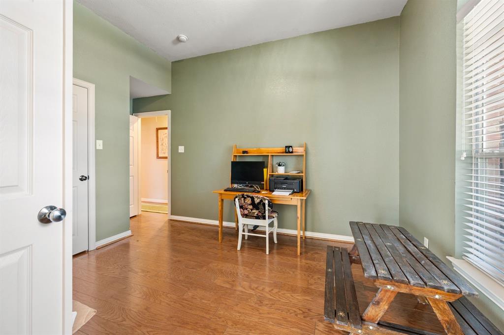 Fourth bedroom or office, between the entry and hallway to secondary bedrooms