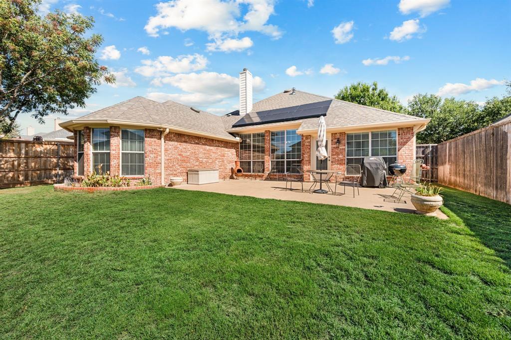 Back yard with extended patio