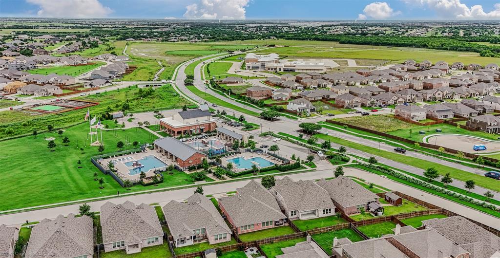 Aerial view of residential area with a pool