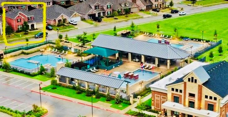 Aerial view of residential area with a pool