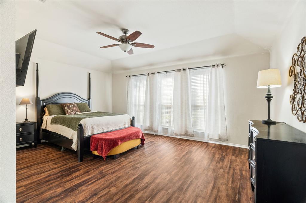 The LVP flooring in the extra large primary suite makes quite an impression.