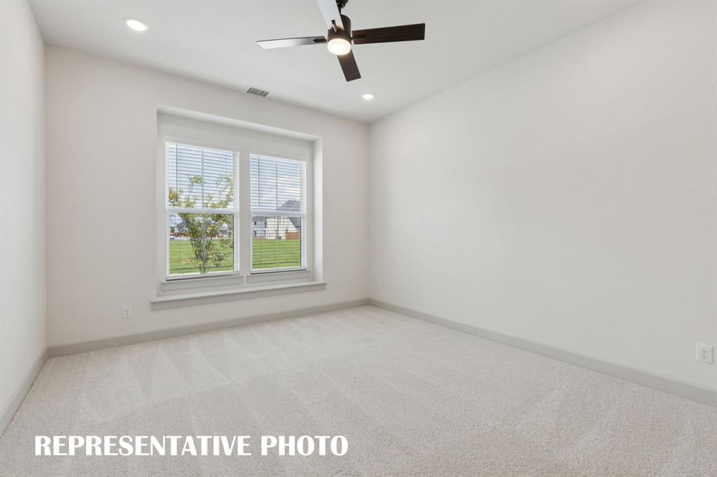 Peaceful and relaxing, this owner's suite is the perfect place to rest and renew at the end of the day.  REPRESENTATIVE PHOTO