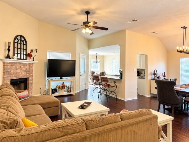 Very open concept wood flooring cozy fireplace