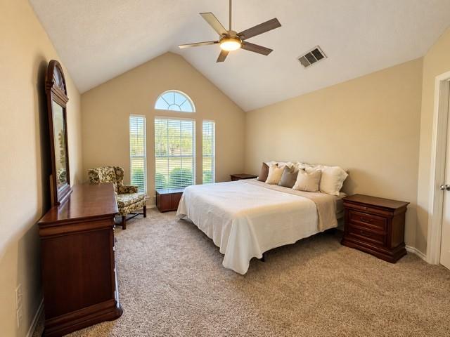 Master room for setting area vaulted ceiling new carpet and  Ceiling fan large window