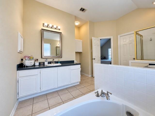 Double vanities his and hers  Jetted tub