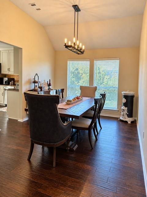 Formal dining very open space accomidates large table