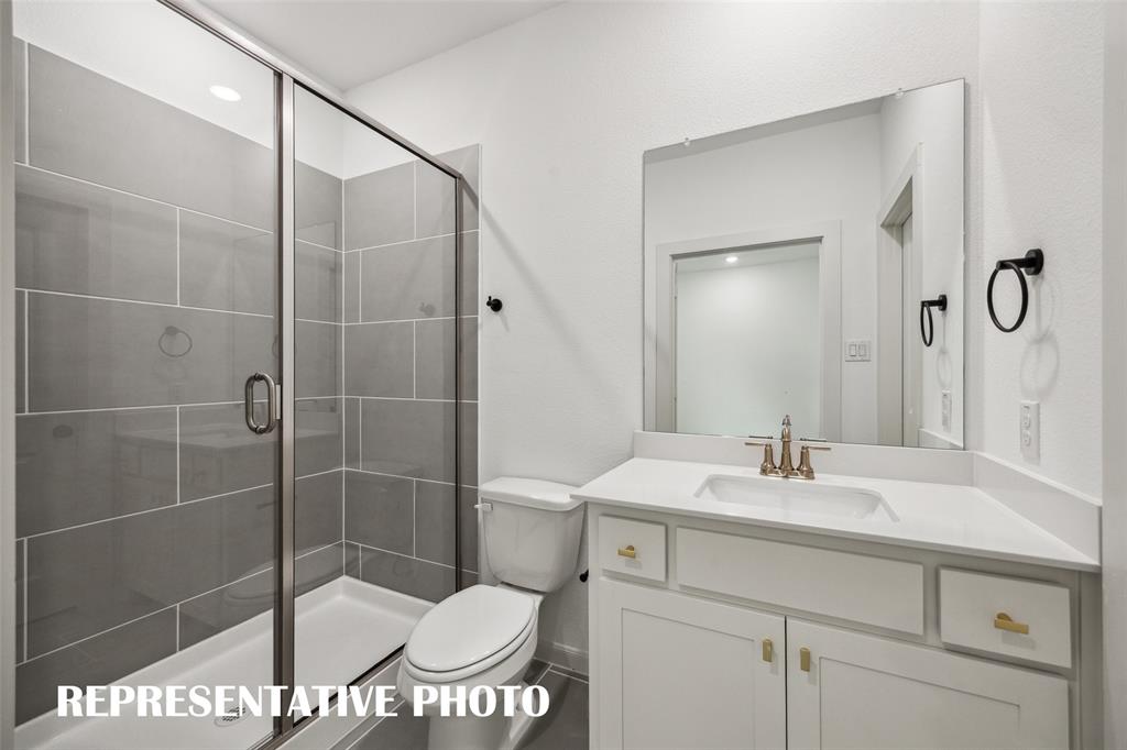 Guests will feel right at home in either of the beautifully finished guest baths.  REPRESENTATIVE PHOTO