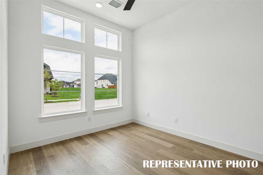 The professional working from home will appreciate the private home office in this wonderful home!  REPRESENTATIVE PHOTO