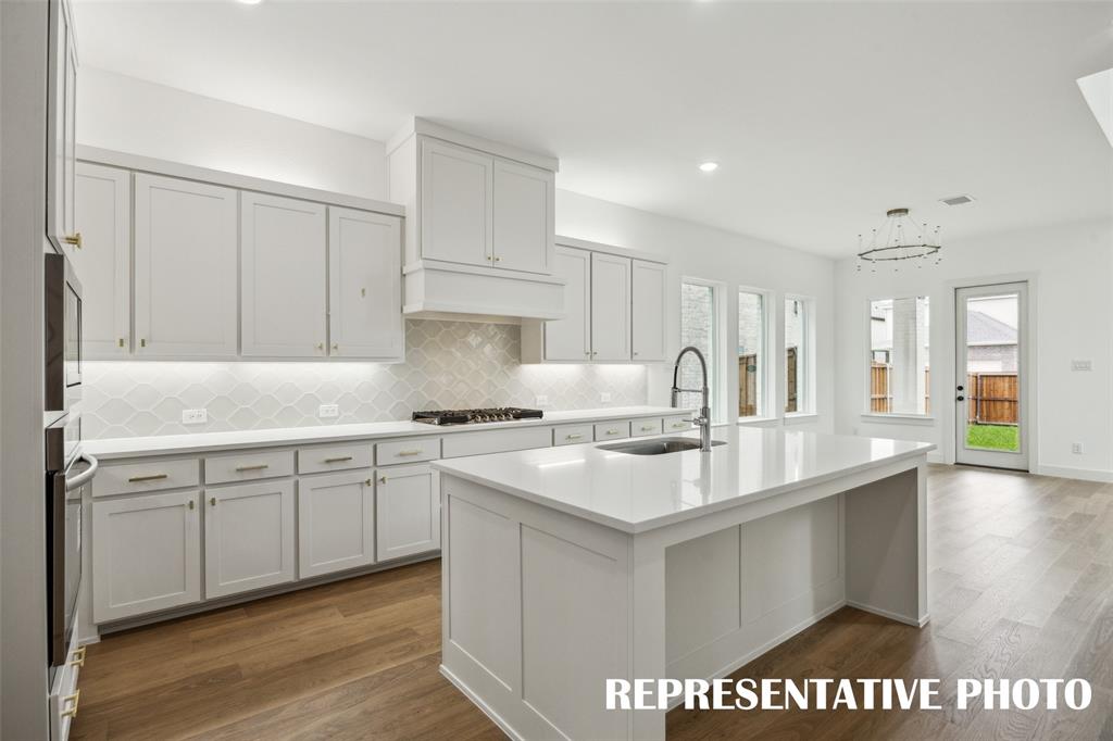 Our Corsica plan offers a spacious kitchen where all the chefs in the family can create gourmet meals!  REPRESENTATIVE PHOTO