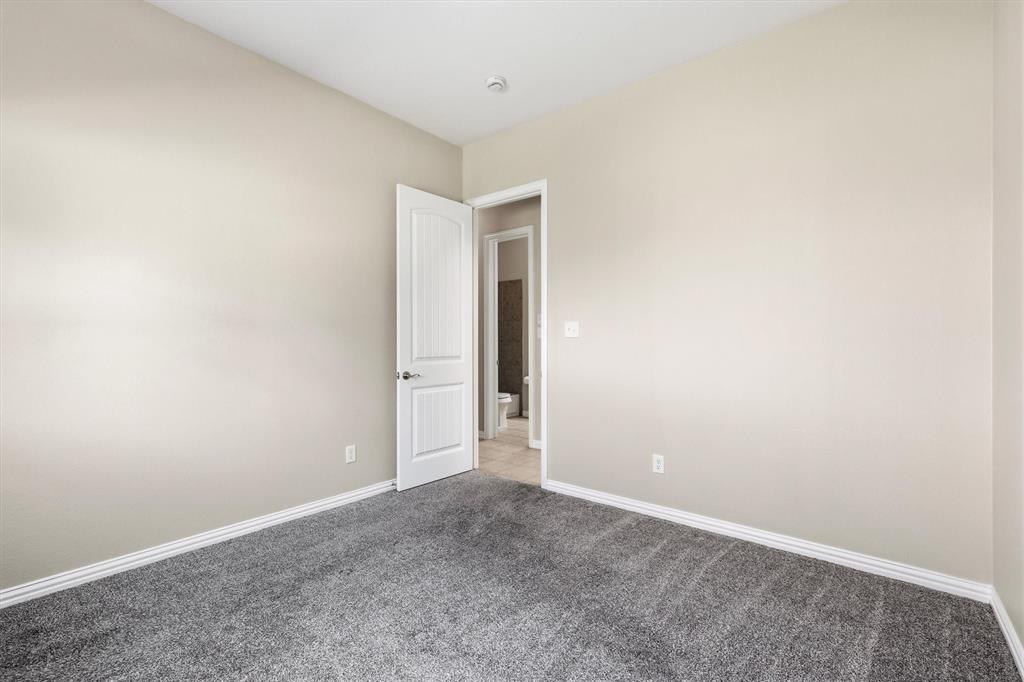 Secondary bedroom downstairs. Perfect for guests or multigenerational living