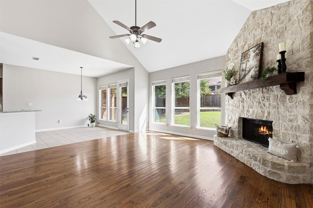 Impressive living room with stone fireplace walla and hearth Impressive living room with stone fireplace walla and hearth